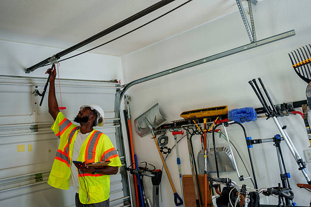 Professional Garage Door Panel Replacement technician working in East Northport, NY